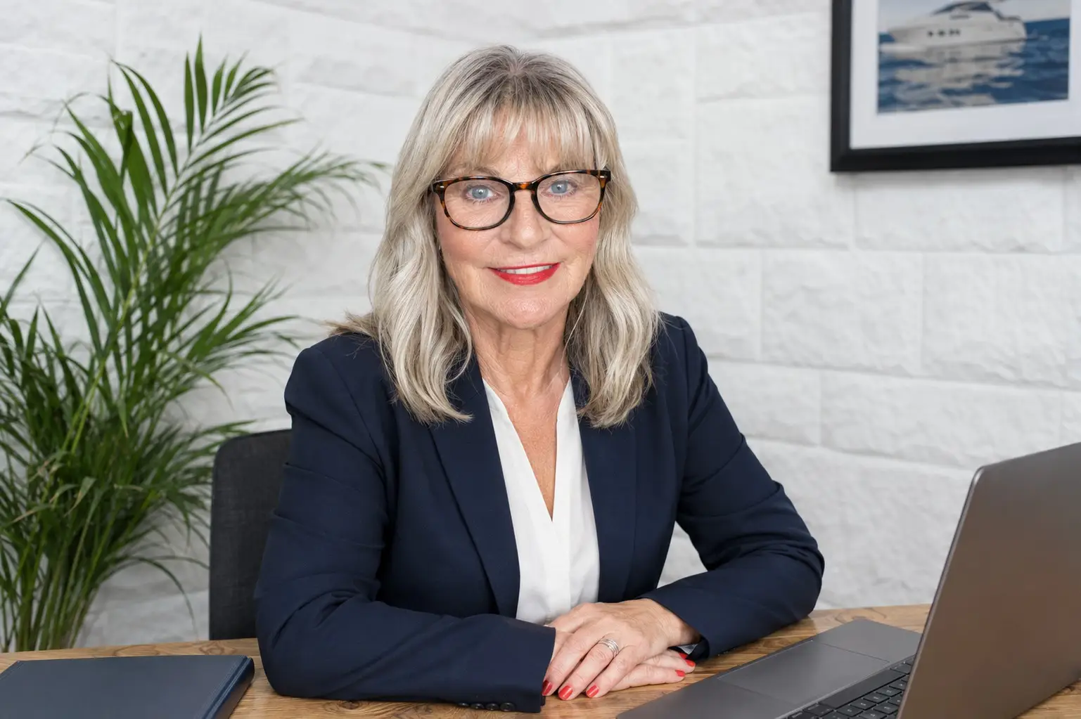 Cara Lees, founder of Cara Lees Yacht Crew, at her desk
