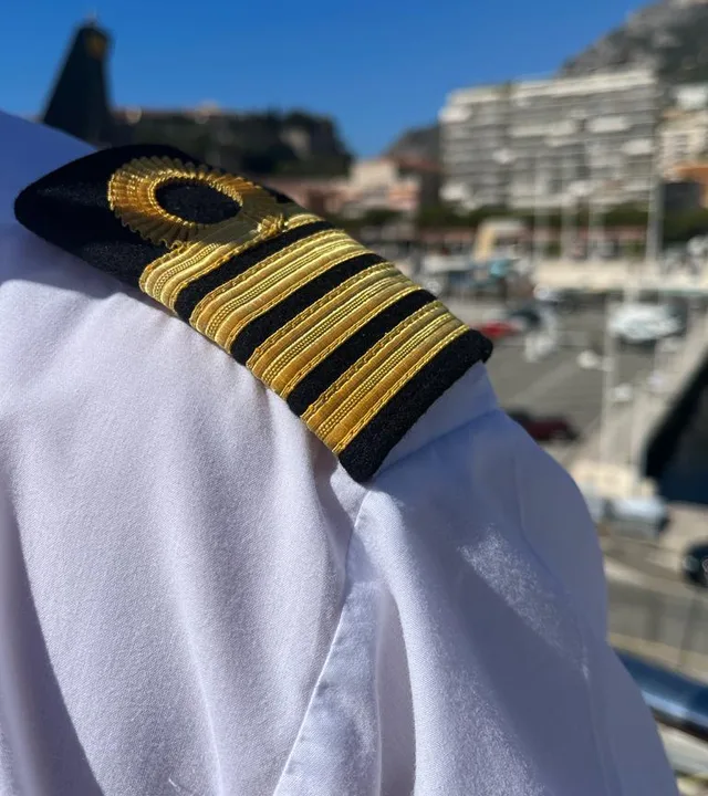 A captain’s gold epaulette, close up
